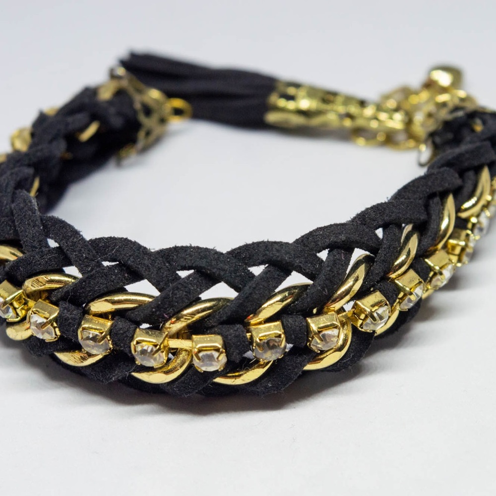Braided leather like fabric braided bracelet with gold links and crystal details